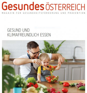 Magazin Cover Vater mit Kind beim Kochen